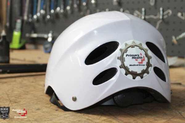 back view of a helmet with a Boise Bicycle Project sticker