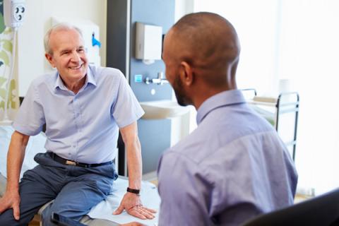 Doctor talking with patient about antibiotic use