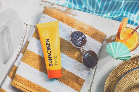 Sunscreen by the pool to use for tanning but aware of UV exposure