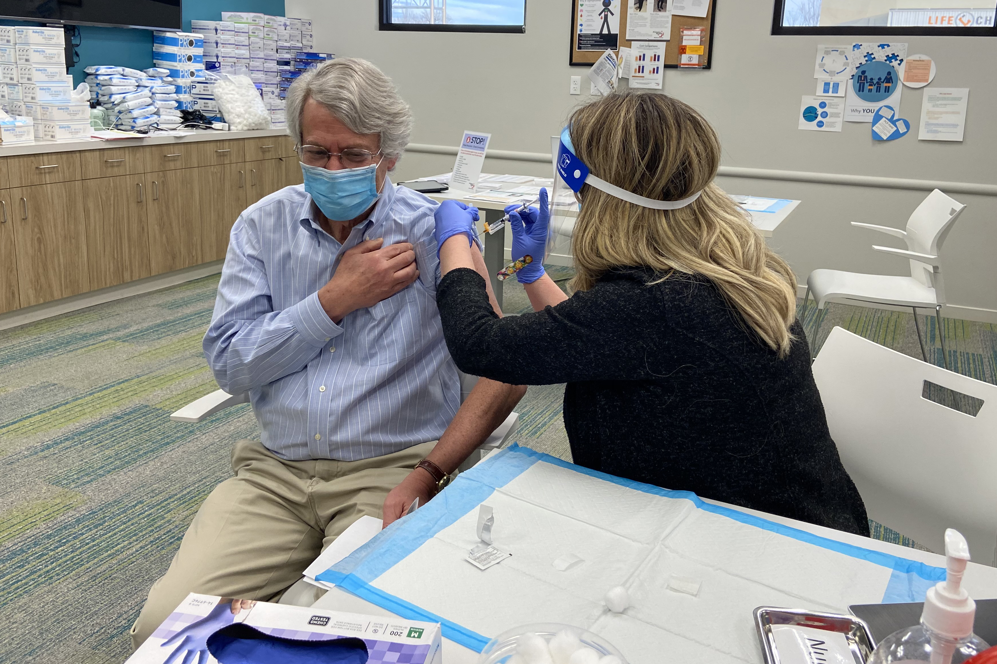 Dr. David Peterman receives his COVID-19 vaccine